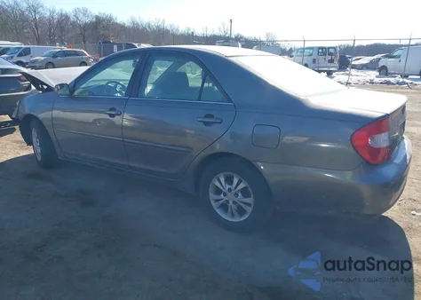 2004 Toyota Camry Le V6 z USA, uszkodzony, nr VIN 4T1BF32K74U586052